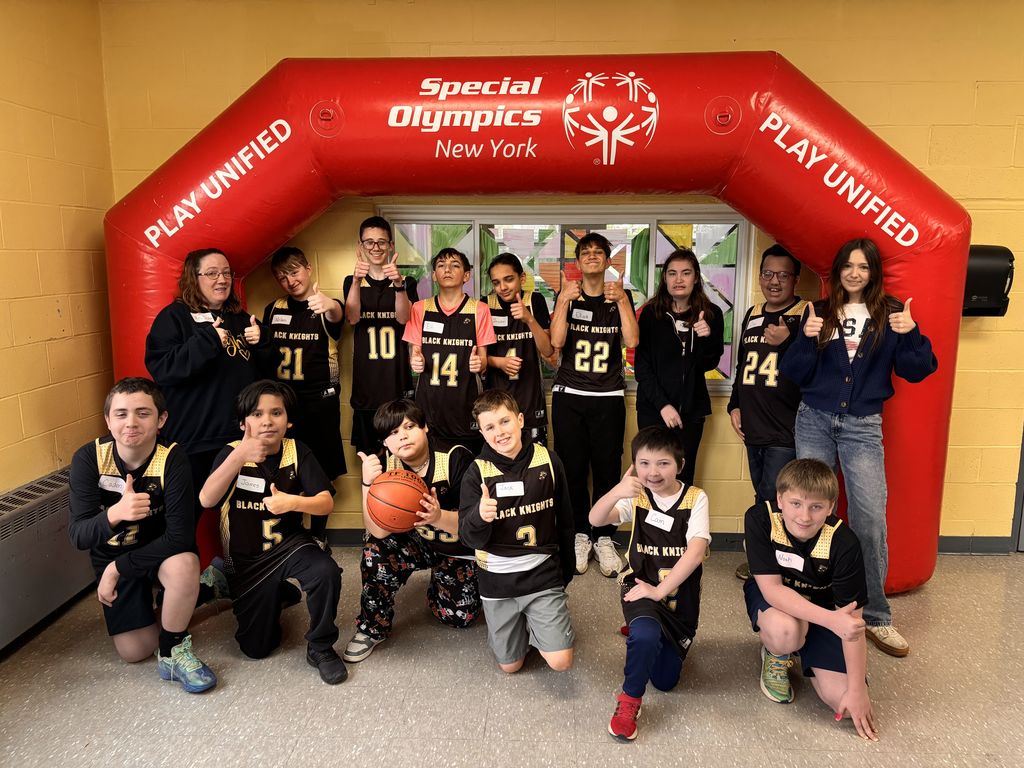 Group Photo of Middle School Unified Students and Mrs. Decker. 