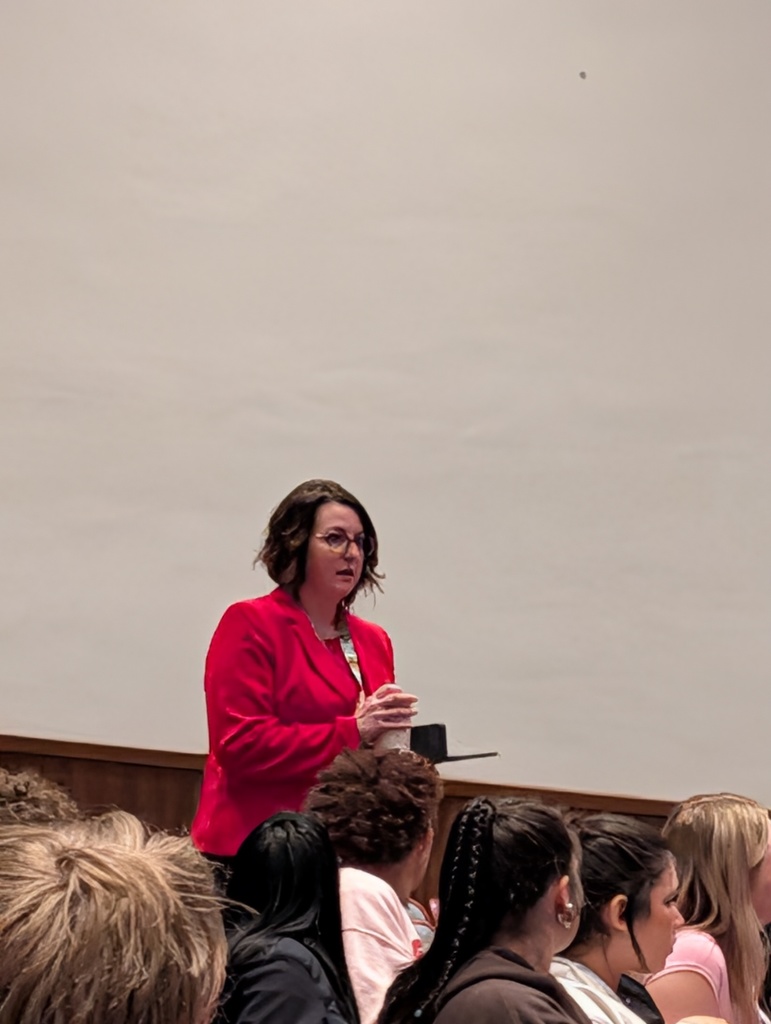 Mrs. Krystofiak addresses students after presentation