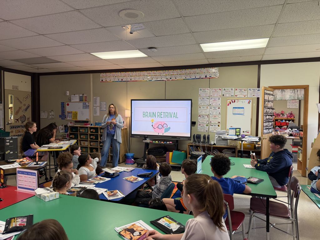 Mrs. Pagano leads an activity.