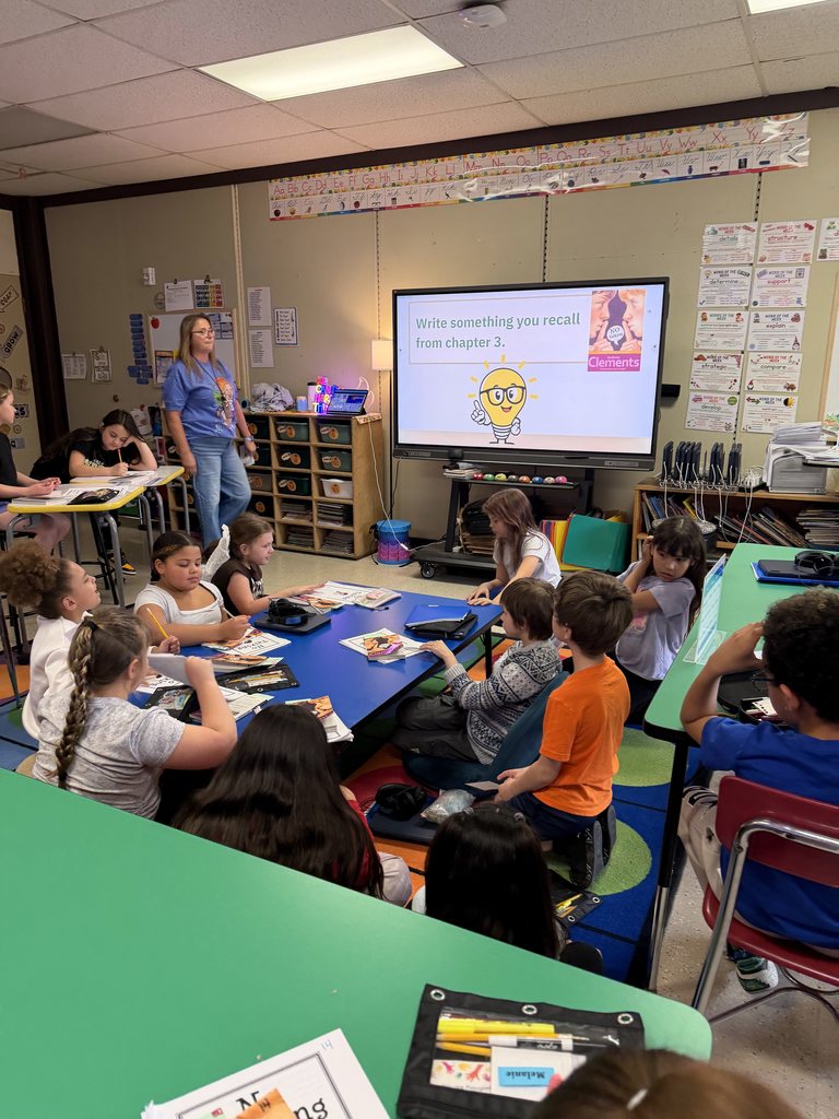 Mrs. Pagano leads an activity.