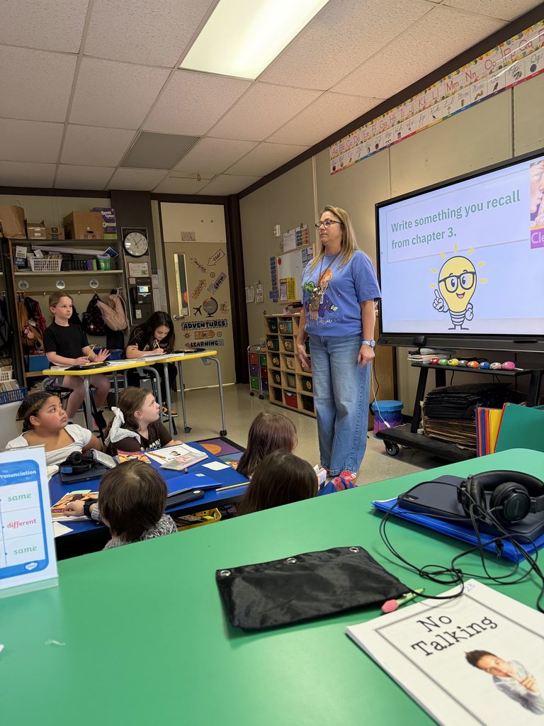 Mrs. Pagano leads an activity.