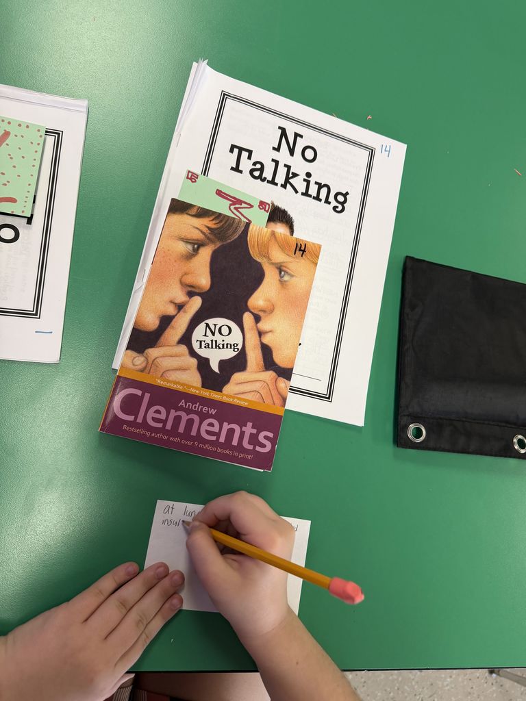 A student writes a reflection. 