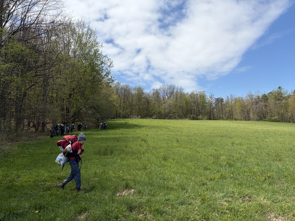 Student hiking with backpack