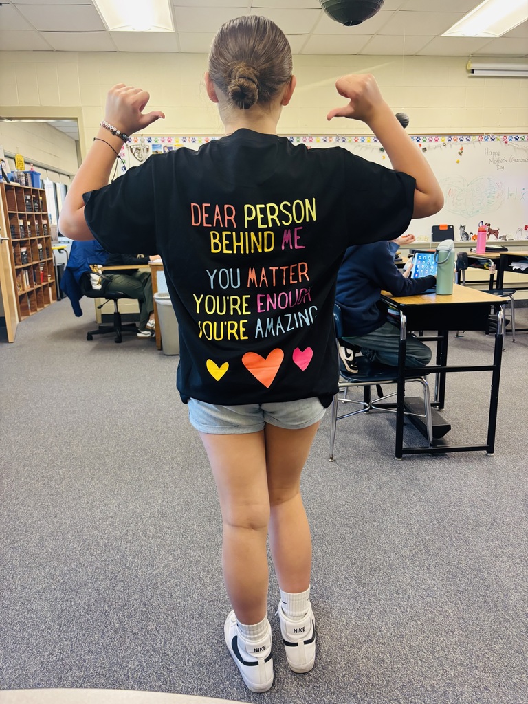 Student in positive shirt.