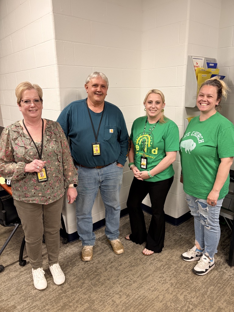 Bus garage staff in green.