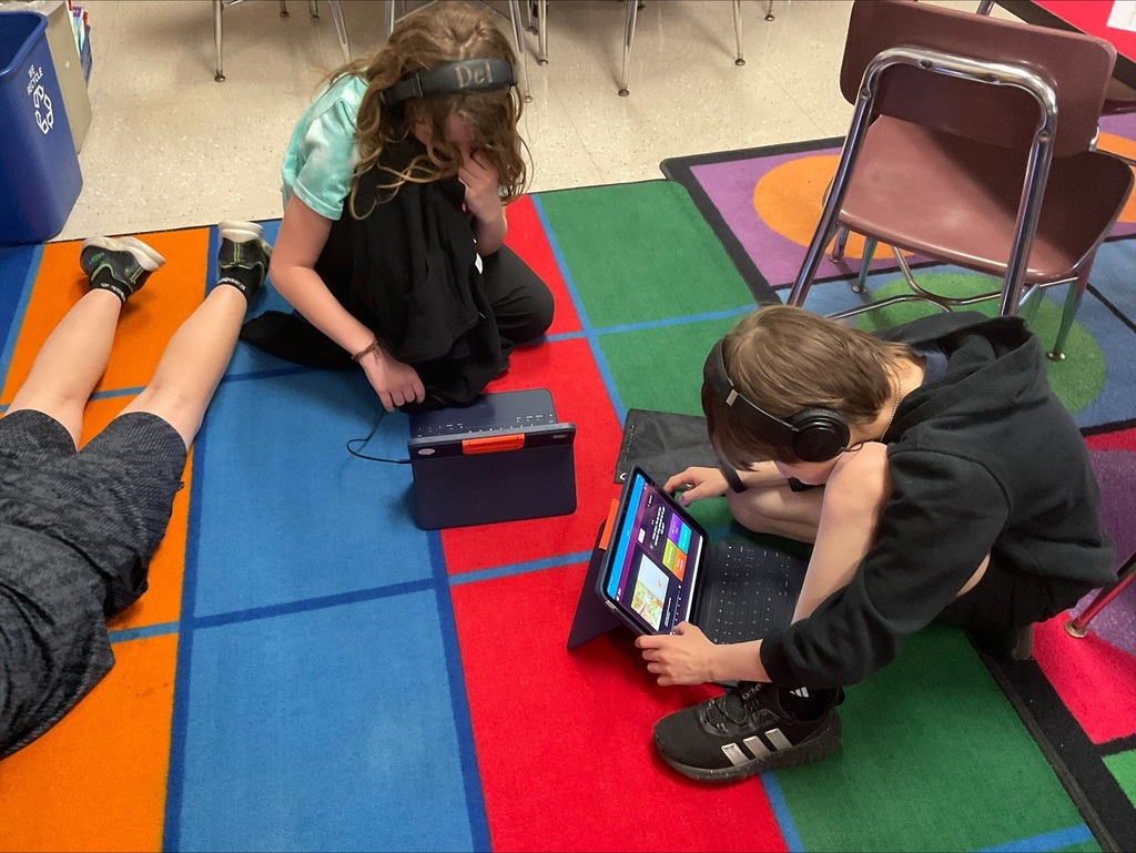 students working on ipads
