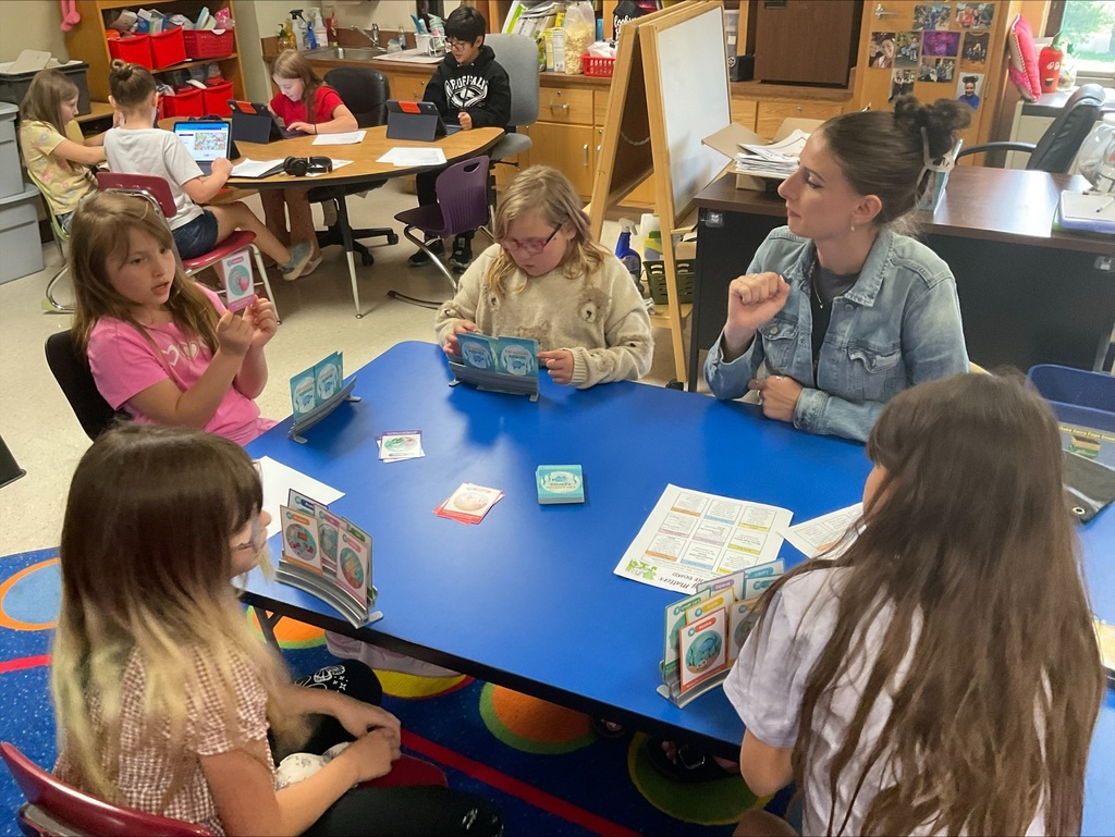 Miss Miller playing a game with students