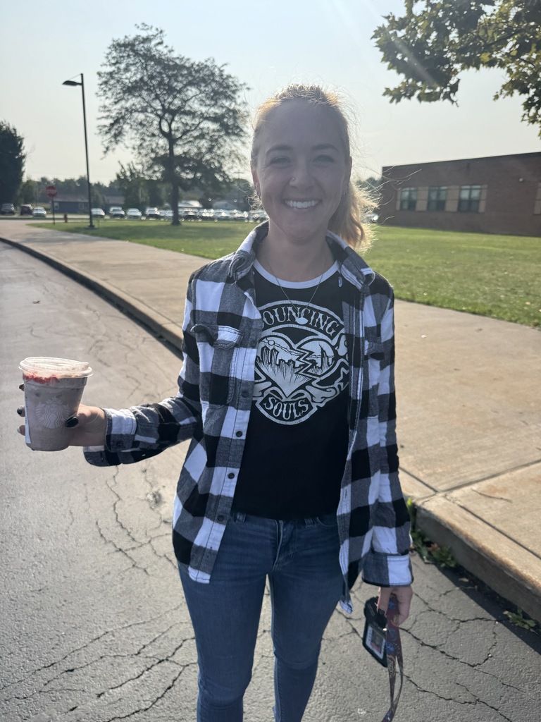 Mrs. Racinowski holding cup