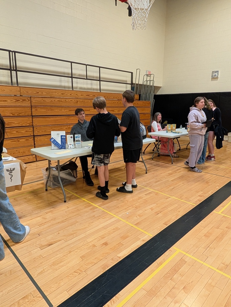 students speaking to career professionals