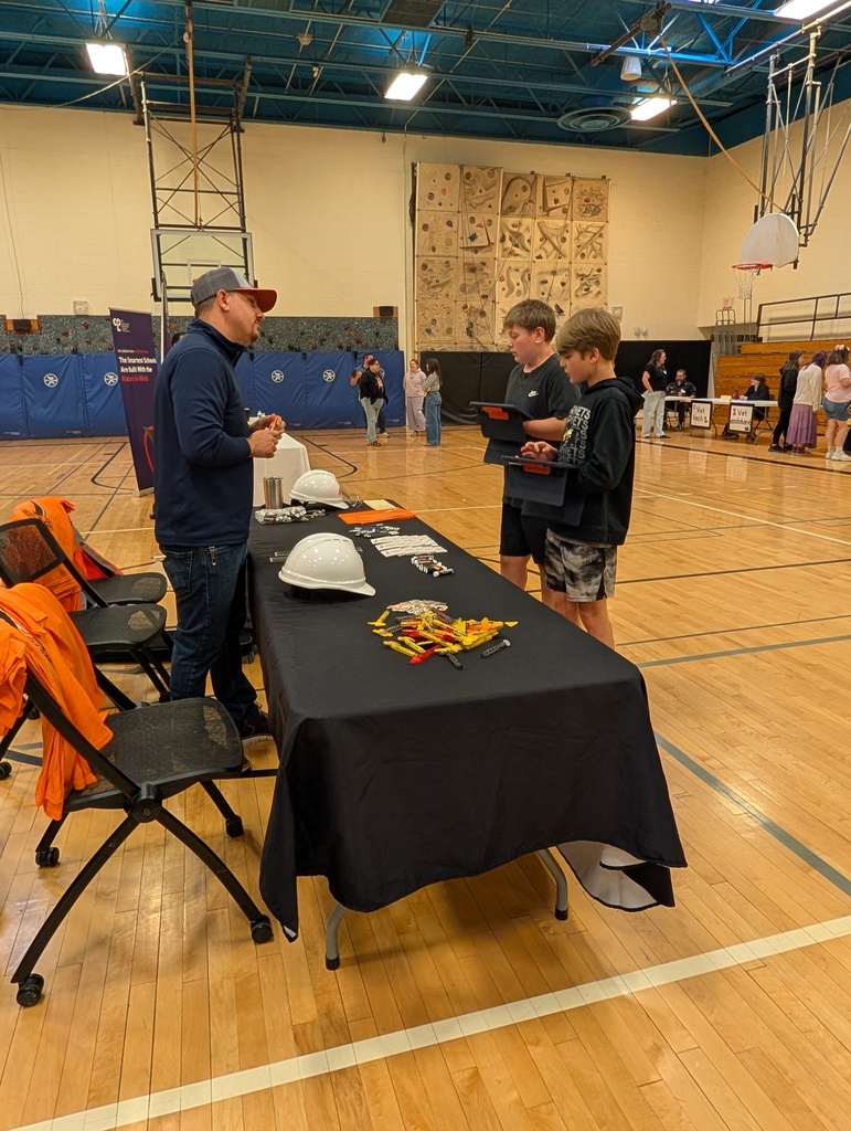 students speaking to career professionals