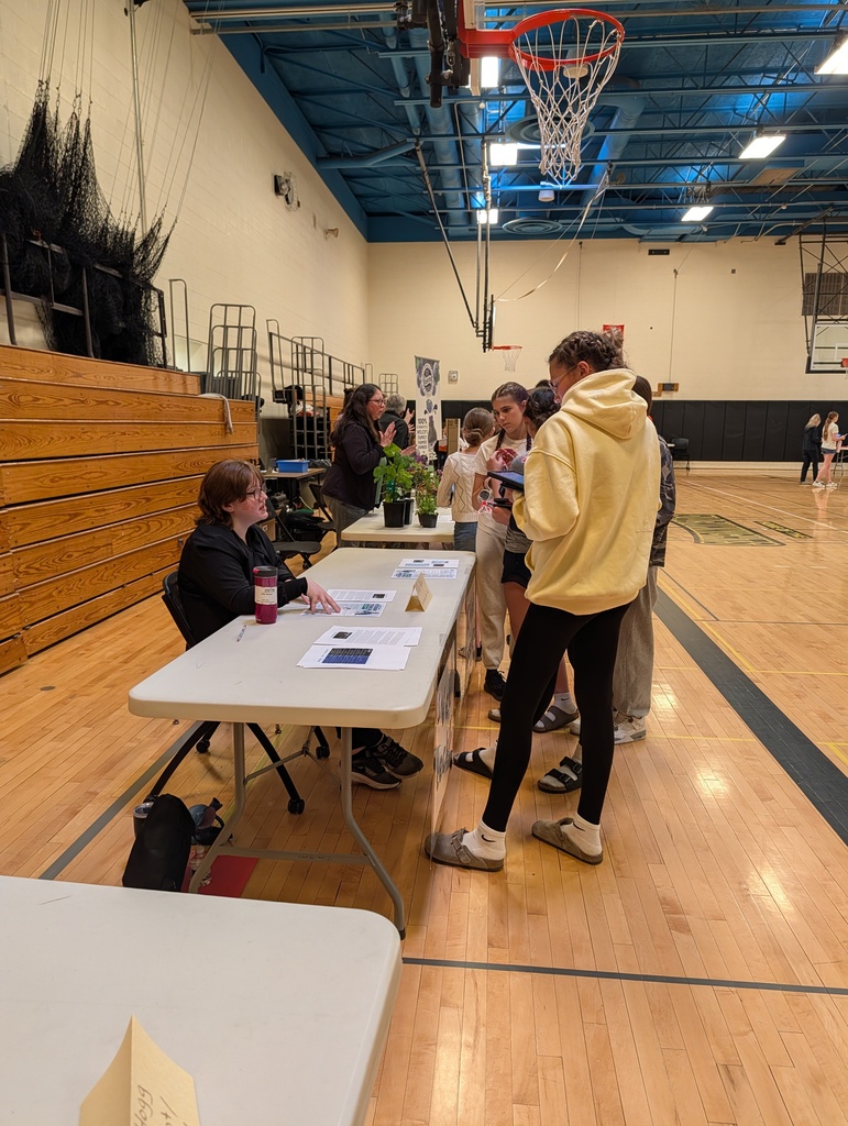 students speaking to career professionals
