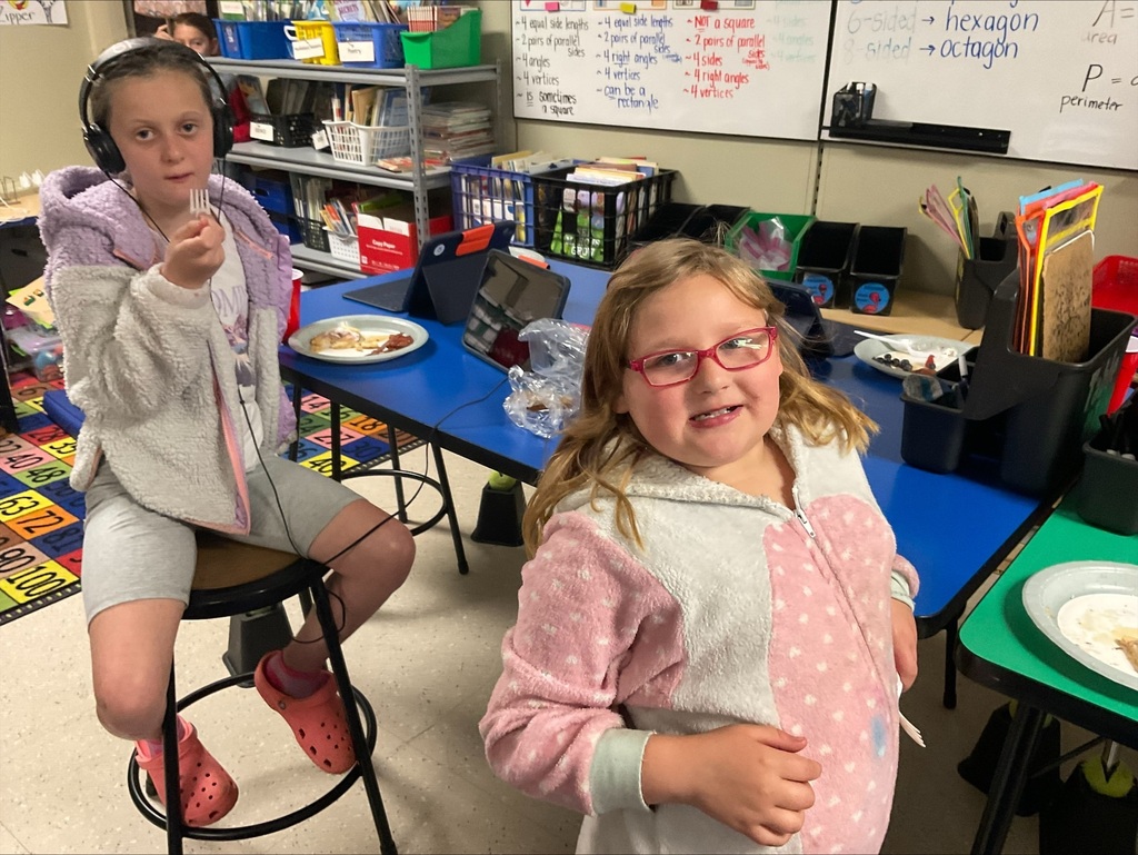 students eat pancakes at the party. 