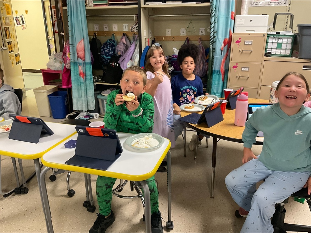 students eat pancakes at the party. 