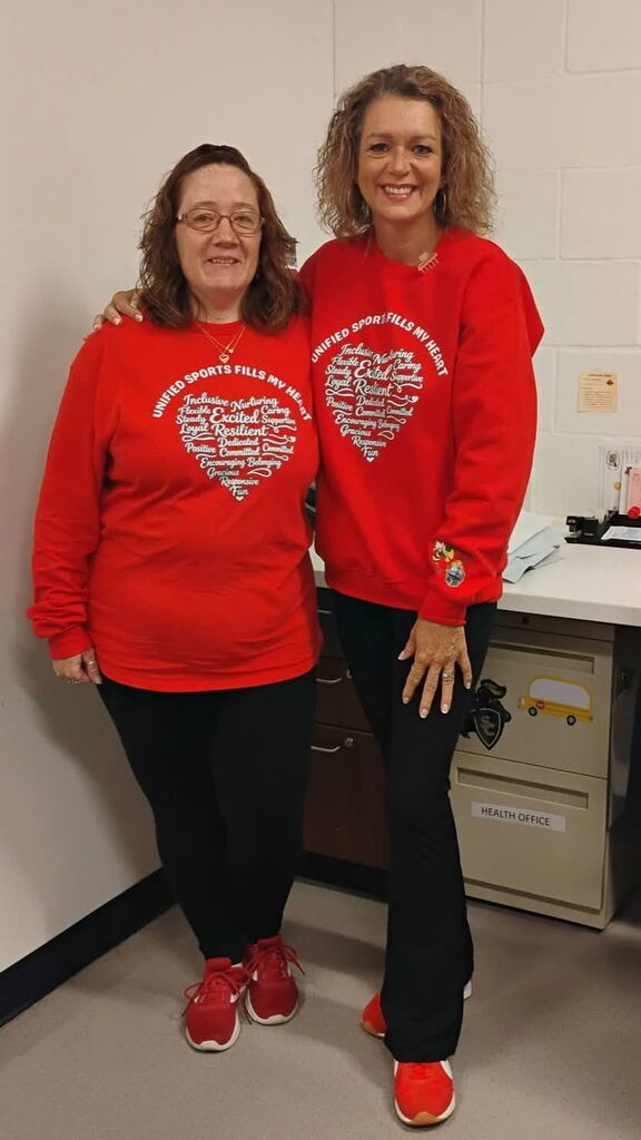Jen and Janet in red sweatshirts