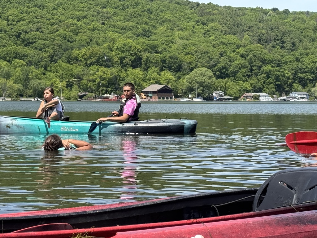 Students in a canoe.