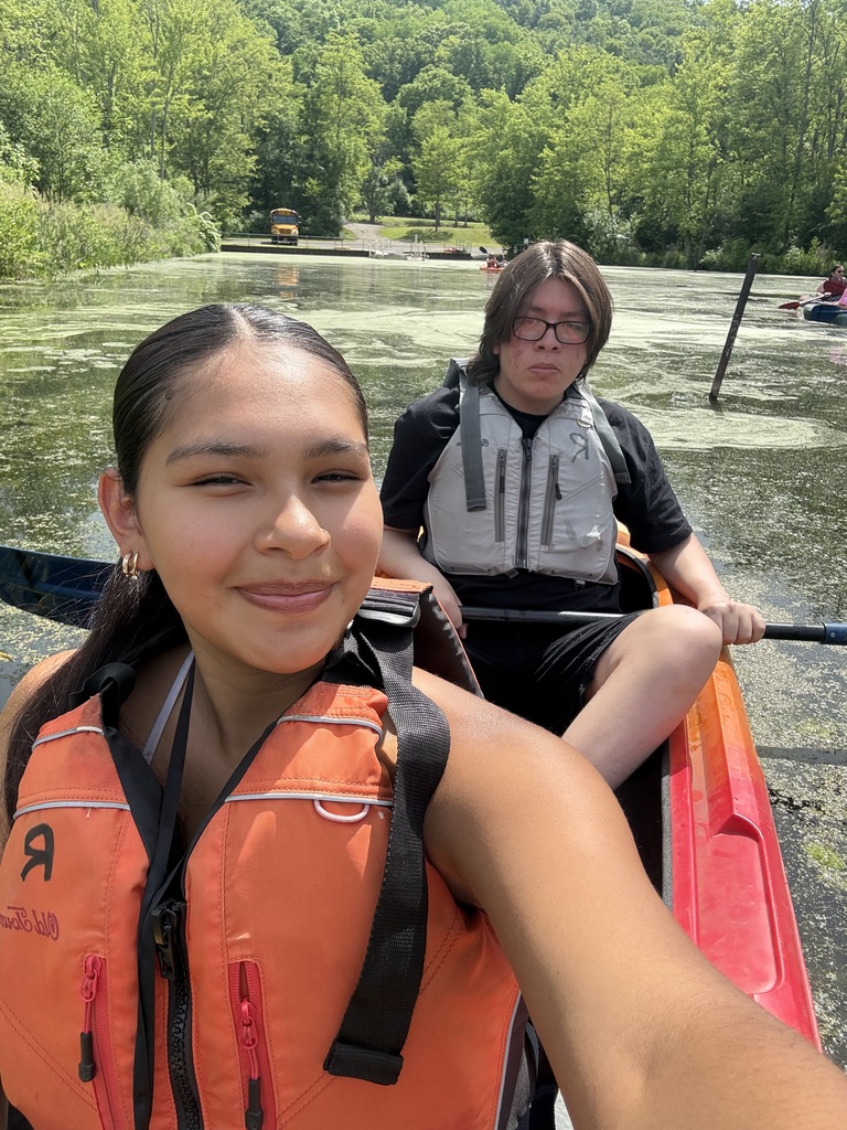 Students in a canoe.