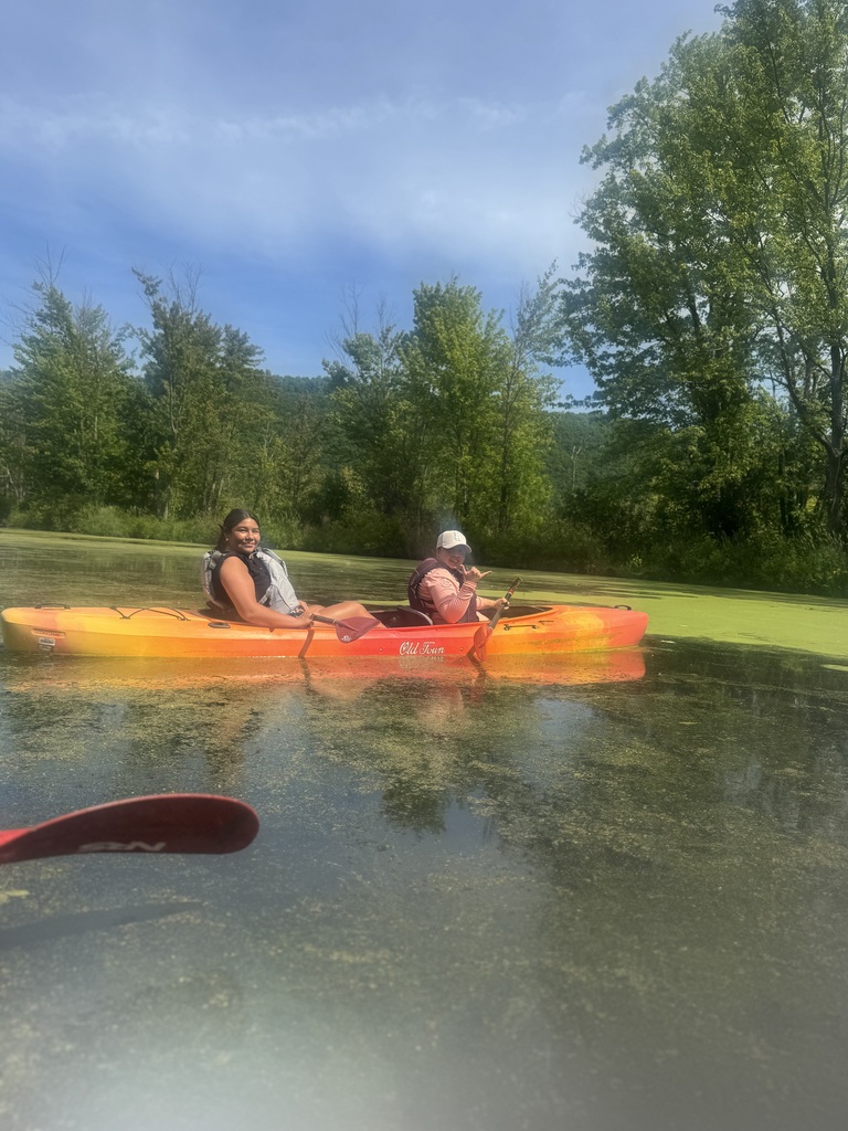 Students in a canoe.
