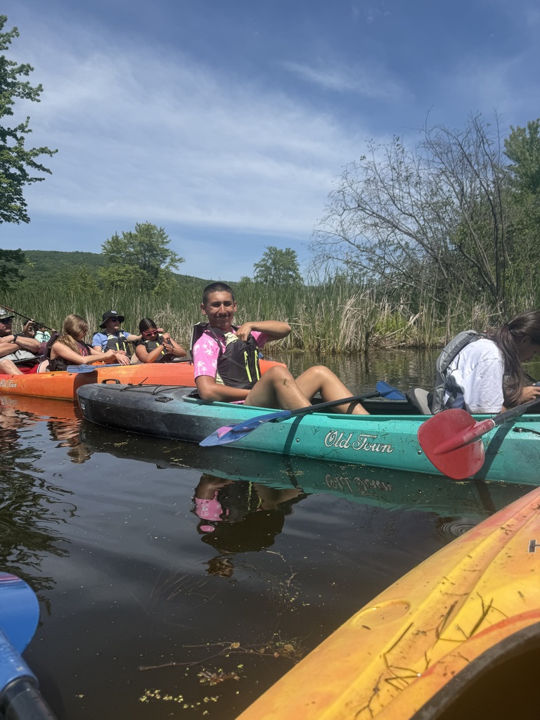 Students in a canoe.