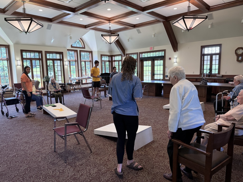 students and senior residents play bean bags