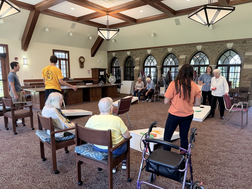 students and senior residents play bean bags