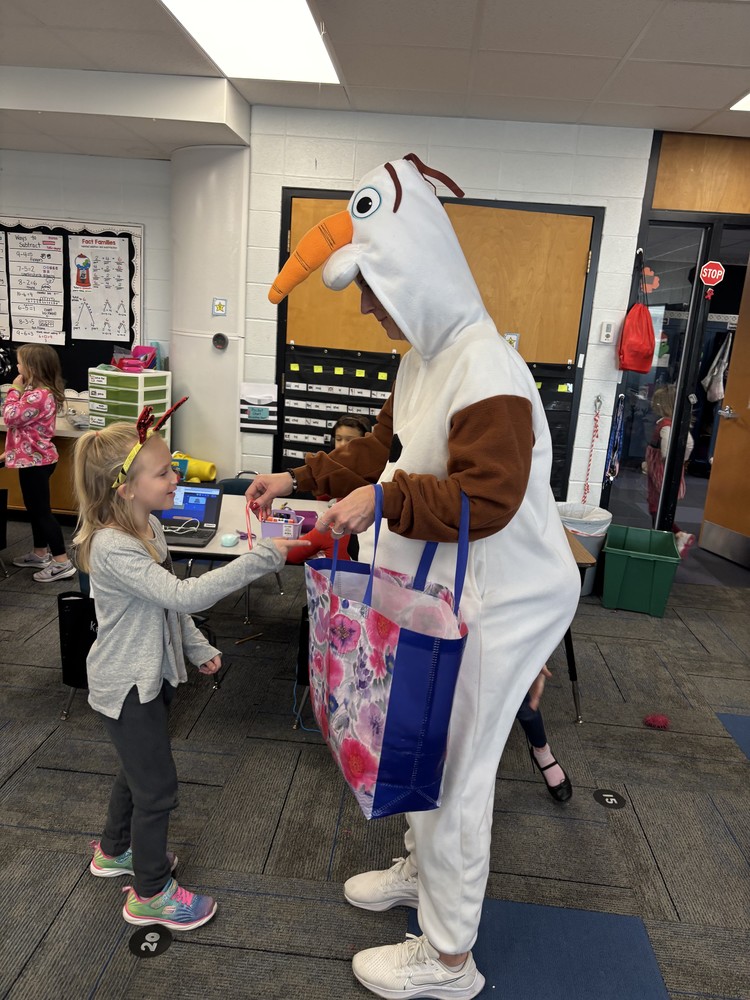 Olaf handing out candy canes
