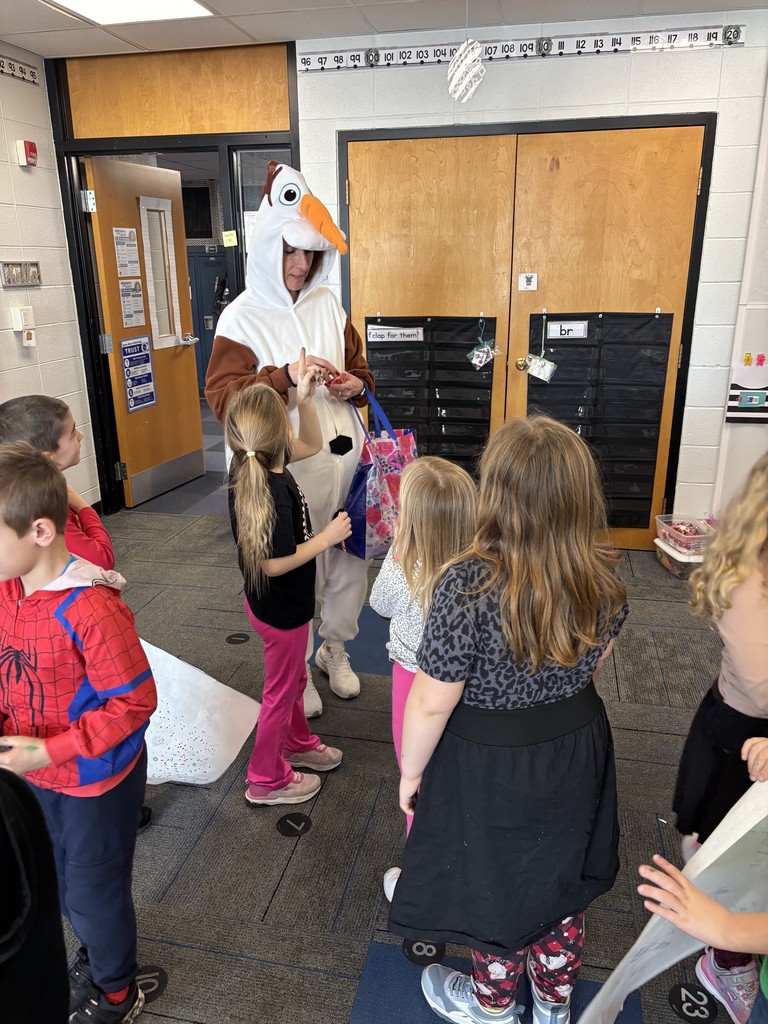 Olaf handing out candy canes