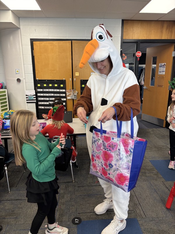 Olaf handing out candy canes