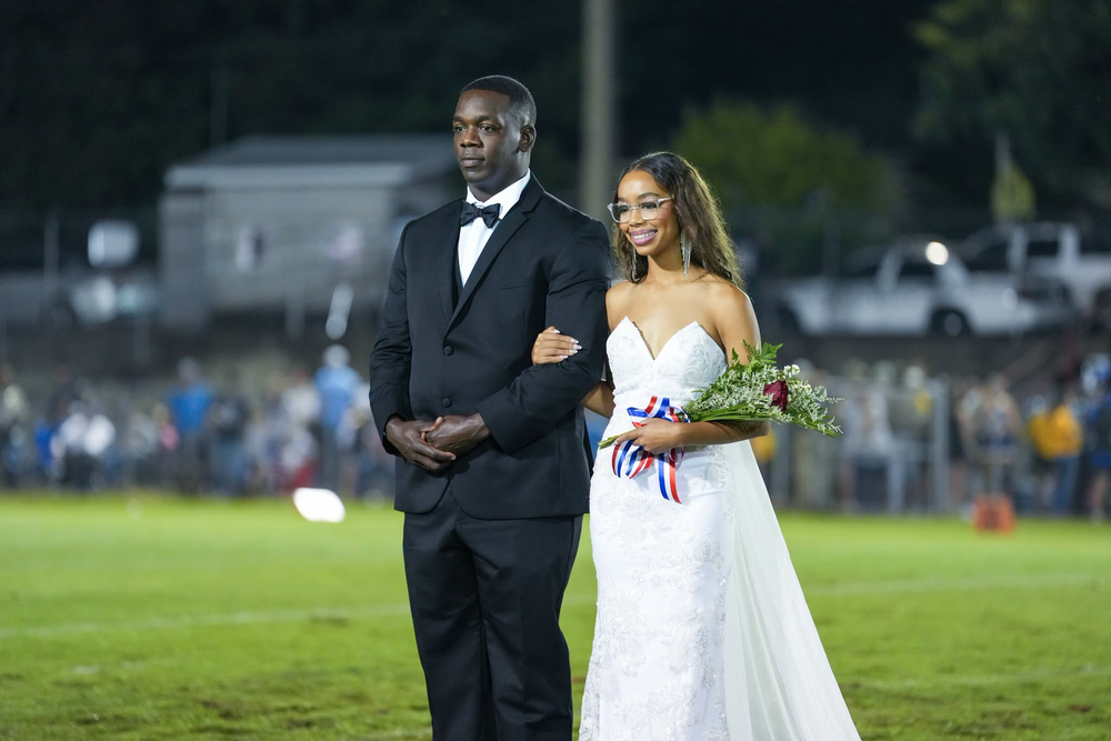Kaylee Brown, Magee High School's 2026 Homecoming Queen, and her dad.