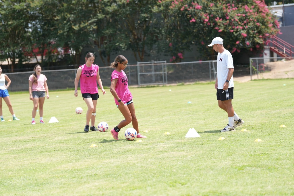 Students playing soccer