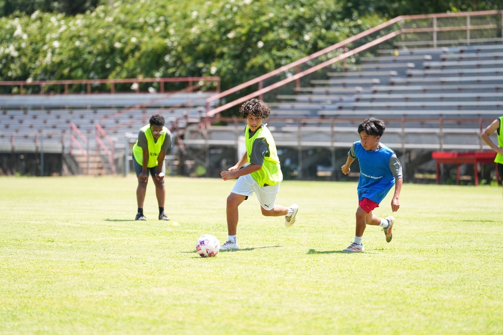 Students playing soccer