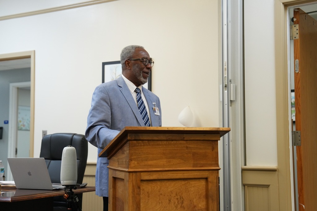 SCSD Board President, Rev. Ralph Walker, giving a speech at a welcome reception for Dr. Robert Sanders.