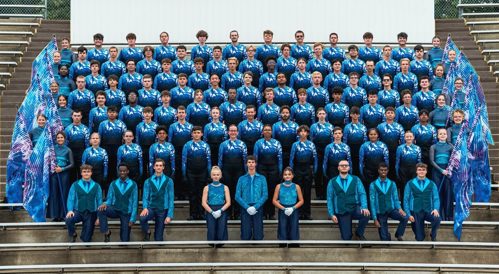 This is a photo of Chandler Arinder participating with Drum Corps International’s (DCI) Memphis Blues. It is a picture of the entire DCI Memphis Blues Band.