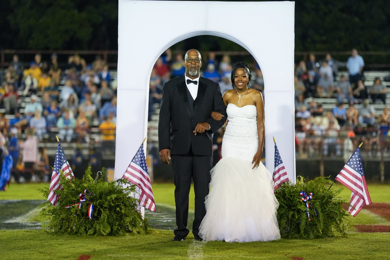 Homecoming maid during halftime at the homecoming game.