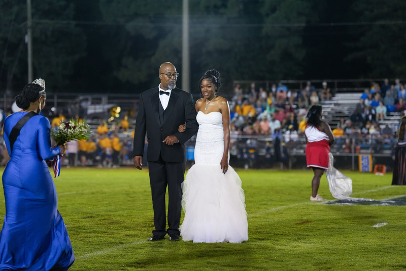 Homecoming maid during halftime at the homecoming game.