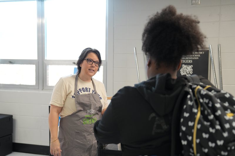 Jana Miller facilitating the taste testing event.
