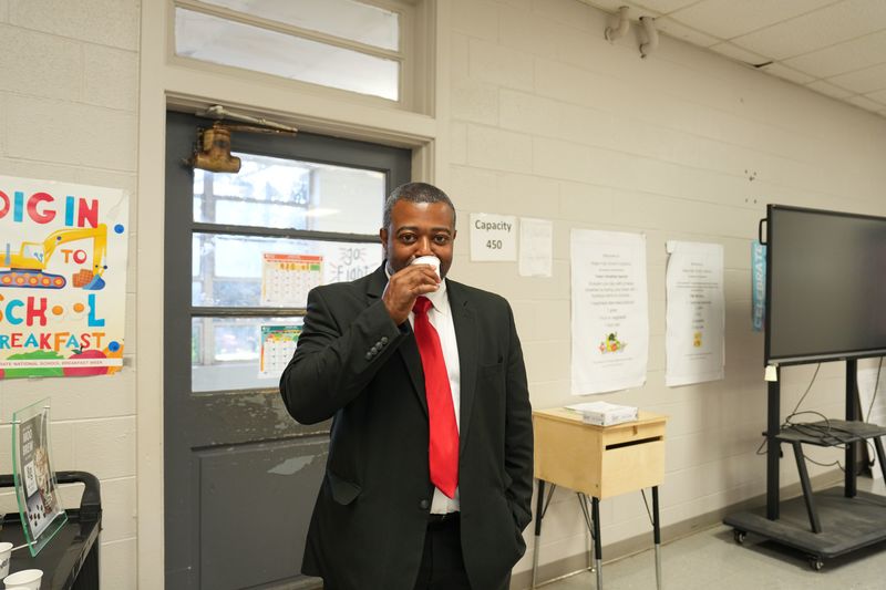 Magee High School Principal is tasting Moo Brew coffee 