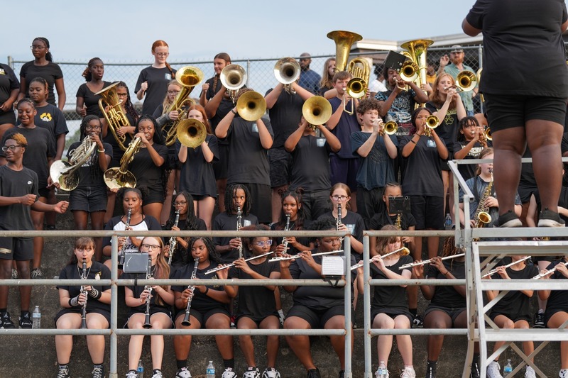 Marching band performing a song at Meet the Tigers