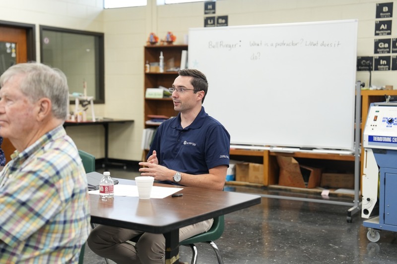 A representative from Entergy is talking during a discussion.