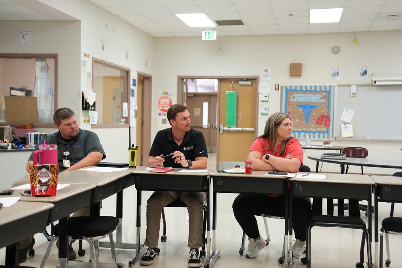 Health Care professionals participate in a group discussion.