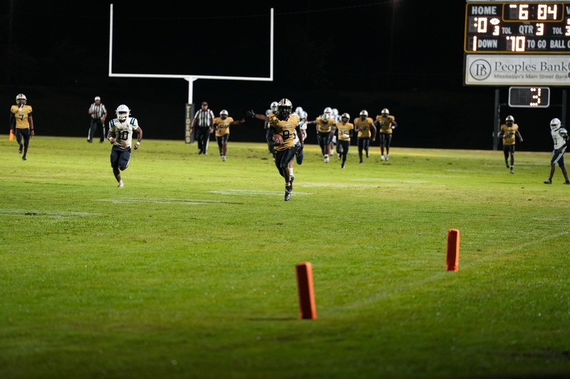 Football player running to end zone