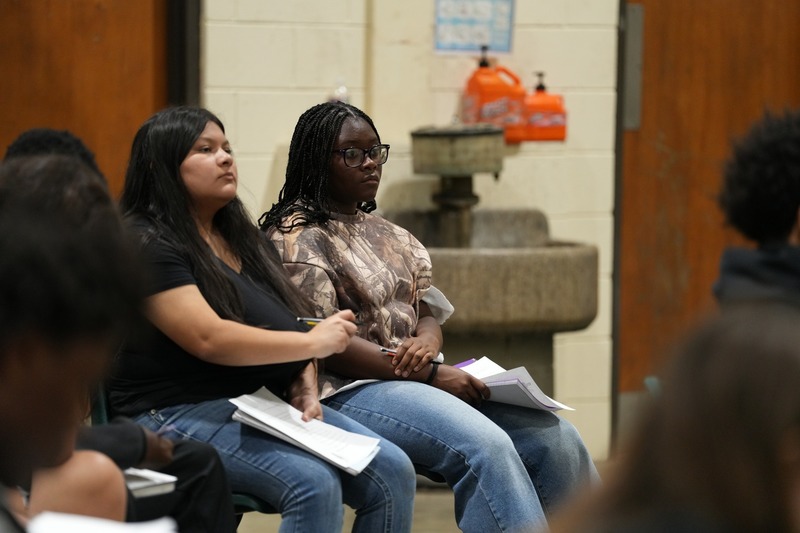 Students listening to John Shoemaker