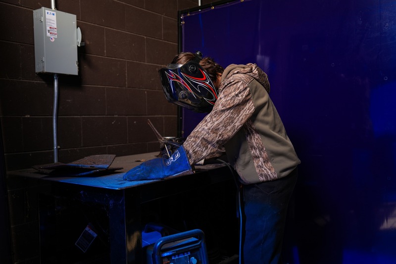 A student is welding