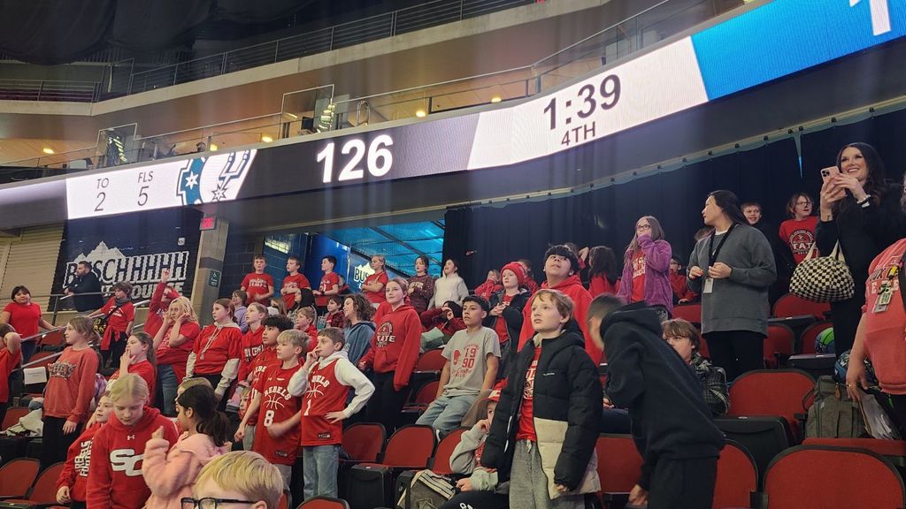 students at iowa wolves game