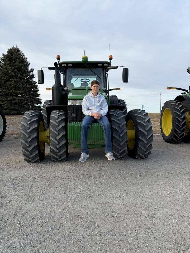 ffa students driving tractors to school