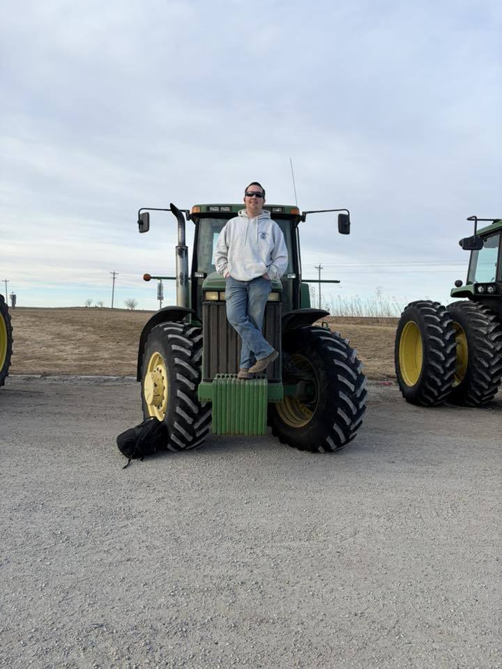ffa students driving tractors to school