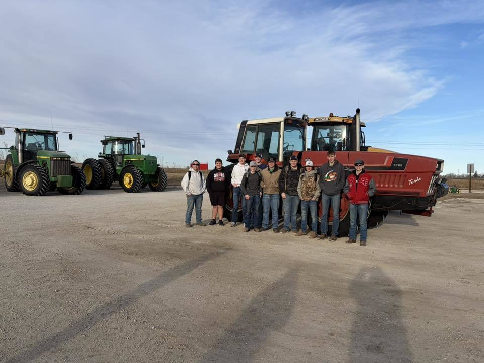 ffa students driving tractors to school