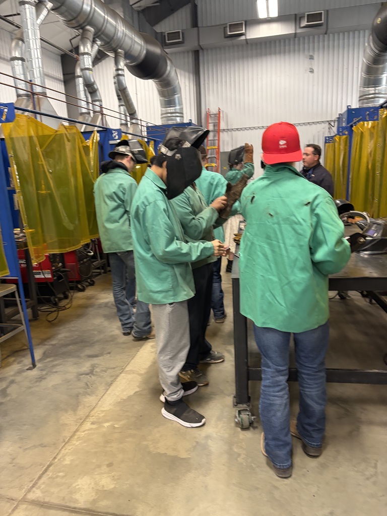 students getting ready to weld