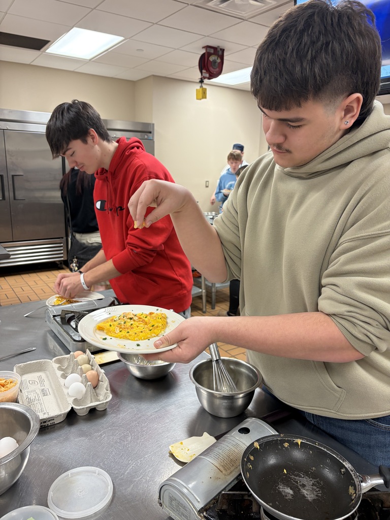 students making a 3 egg omelette