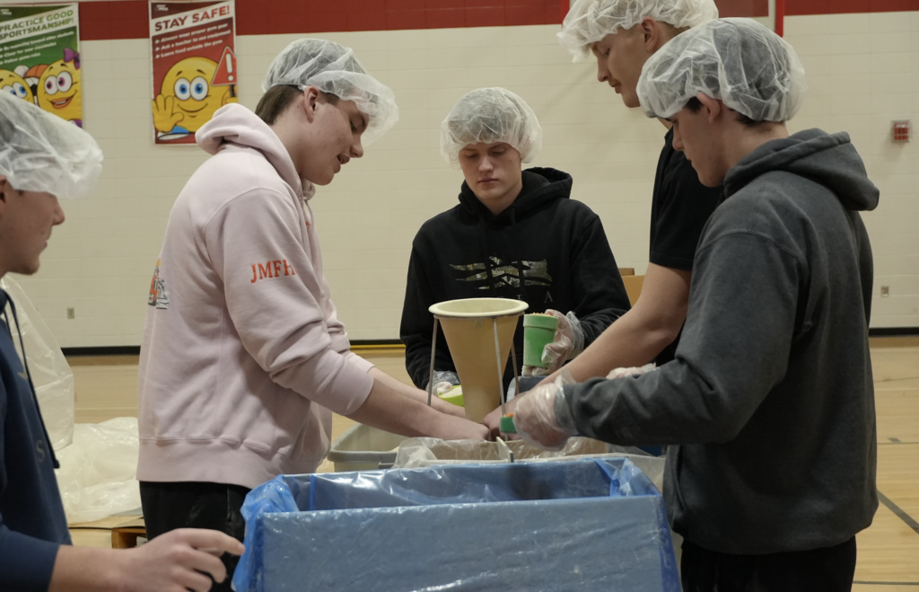 Students packing meals