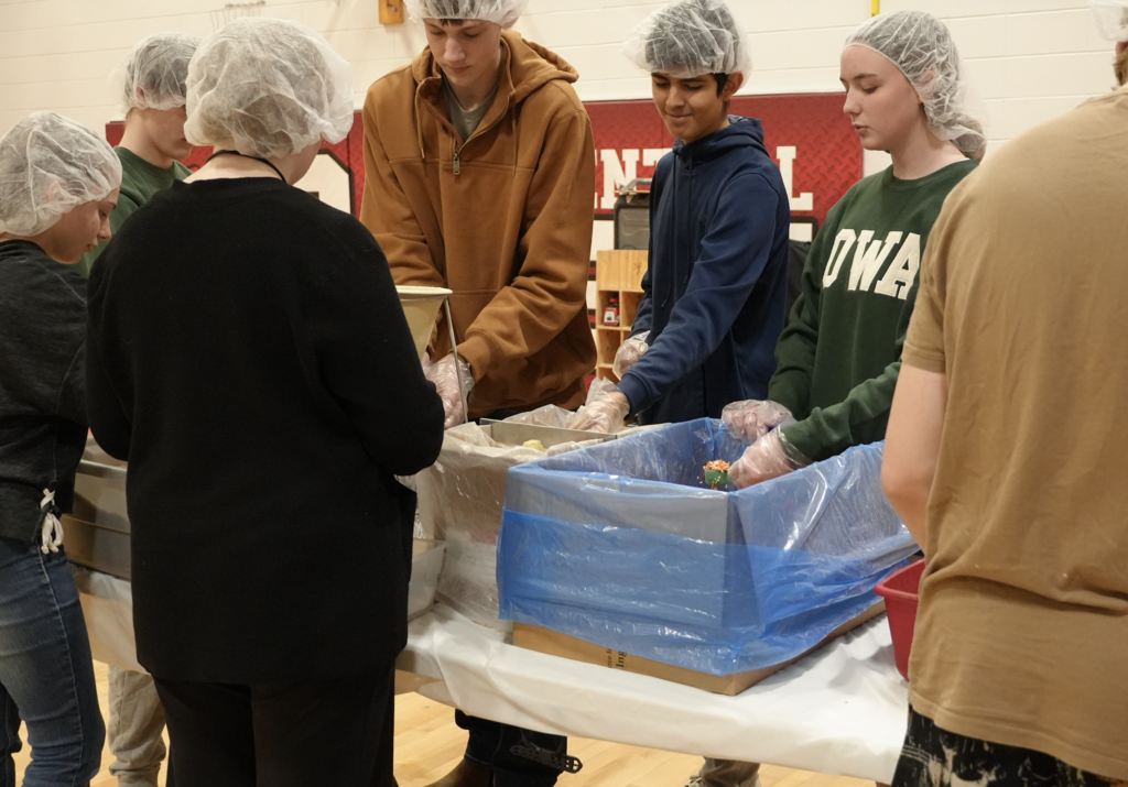 Students packing meals
